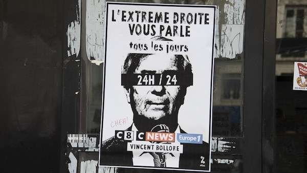 A poster with Vincent Bollore and C8, CNEWS, Europe 1, on which is written The far right is talking to you, in french L Extreme droite vous parle, during a demonstration in Paris on March 22, 2025, as part of the international day against racism and fascism. (Photo by Magali Cohen / Hans Lucas / Hans Lucas via AFP) (Photo by MAGALI COHEN/Hans Lucas/AFP via Getty Images)